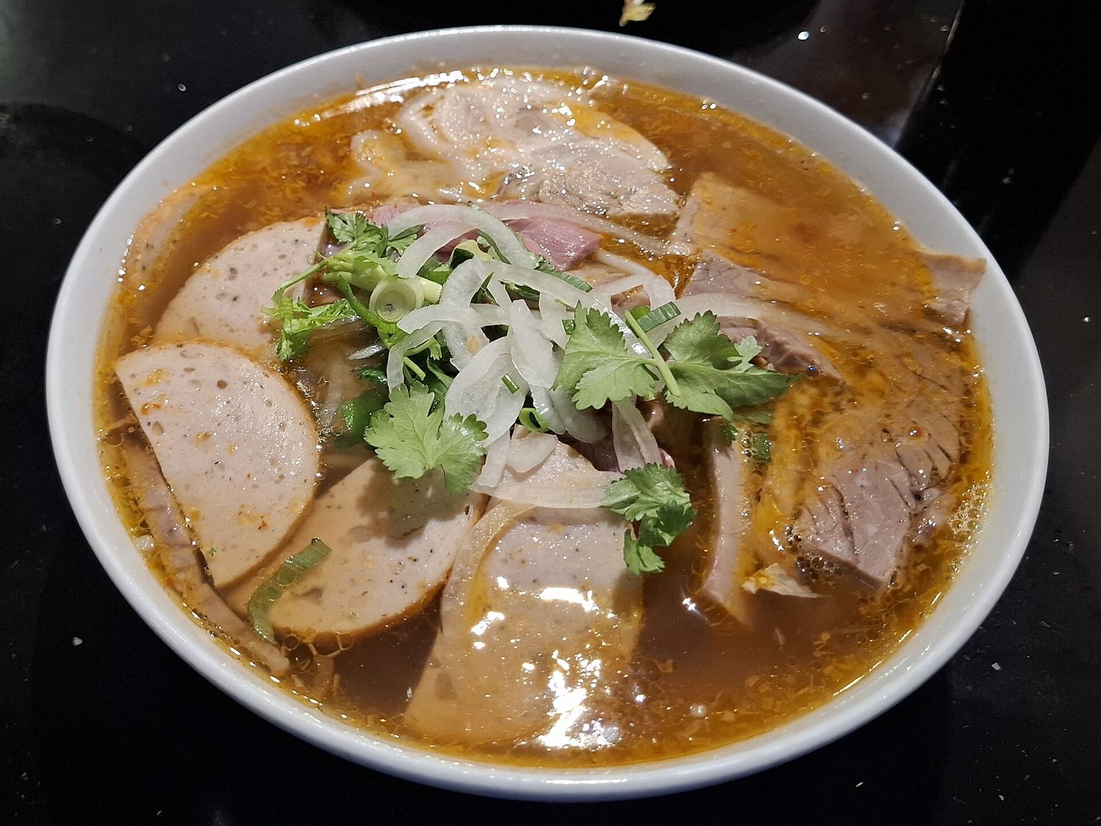 A bowl of bún bò Huế before the walk.